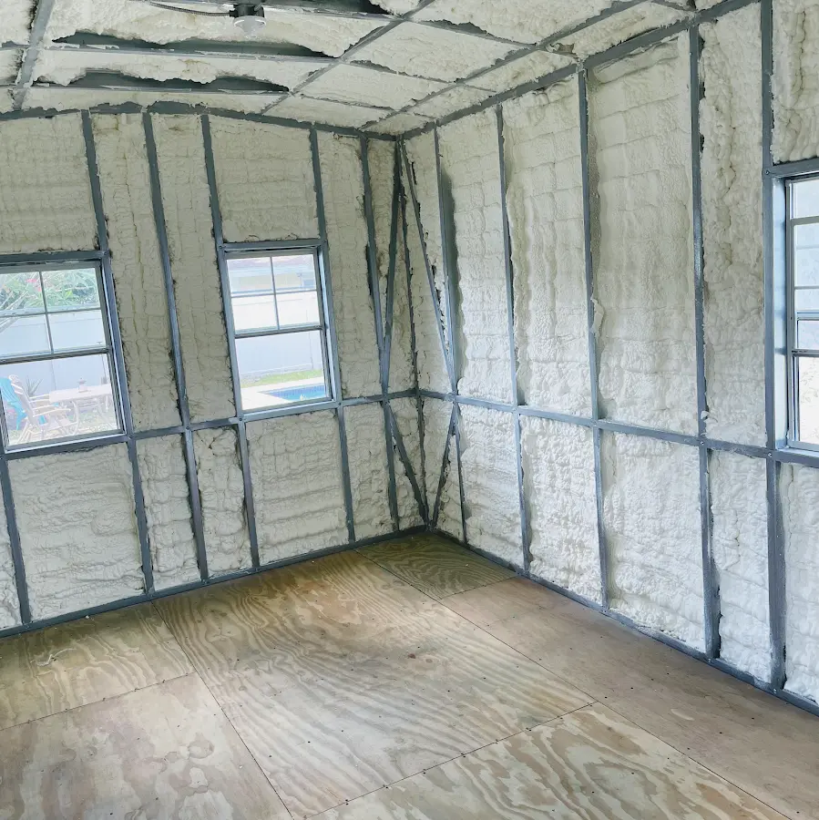 Closed-cell spray foam insulation applied to wall cavities in a residential project in Homestead